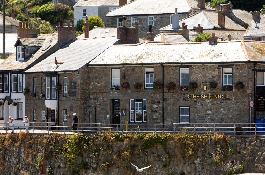 The Ship Inn, a historic pub looking out on the harbour in Mousehole (Visit Cornwall) The Ship Inn, a historic pub looking out on the harbour in Mousehole (Visit Cornwall)