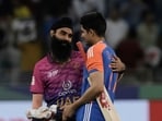 United Arab Emirates's Simranjeet Singh, left, talks with India's Shubman Gill after India won the match during the Asia Cup 2025