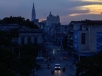 Cars drive along a dark street during a national power grid collapse, the fourth in less than a year, which caused a nationwide blackout, in Havana, Cuba September 10, 2025. 