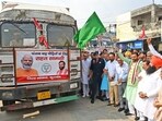 Haryana chief minister Nayab Singh Saini flagging off trucks with relief material for flood-hit Punjab in Kurukshetra on Wednesday. (Sourced) Haryana chief minister Nayab Singh Saini flagging off trucks with relief material for flood-hit Punjab in Kurukshetra on Wednesday. (Sourced)