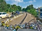 Repair work underway after a retaining wall collapsed along the road connecting Jagraon bridge and Vishwakarma Chowk in Ludhiana. (Gurpreet Singh/HT) Repair work underway after a retaining wall collapsed along the road connecting Jagraon bridge and Vishwakarma Chowk in Ludhiana. (Gurpreet Singh/HT)