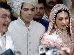 Karisma Kapoor and Sunjay Kapur with Randhir Kapoor at their wedding. Karisma Kapoor and Sunjay Kapur with Randhir Kapoor at their wedding.