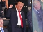 U.S. President Donald Trump gestures as he attends the Yankees Baseball Game 