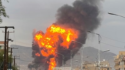 Flames and smoke rise following Israeli airstrikes in Sanaa, Yemen, (AP) Flames and smoke rise following Israeli airstrikes in Sanaa, Yemen, (AP)