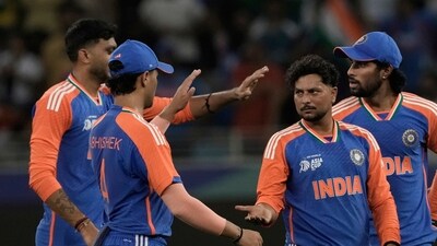 India's Kuldeep Yadav, second right, celebrates the wicket of United Arab Emirates's Rahul Chopra during the Asia Cup. (AP) India's Kuldeep Yadav, second right, celebrates the wicket of United Arab Emirates's Rahul Chopra during the Asia Cup. (AP)