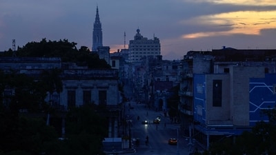 Cars drive along a dark street during a national power grid collapse, the fourth in less than a year, which caused a nationwide blackout, in Havana, Cuba September 10, 2025. (REUTERS)