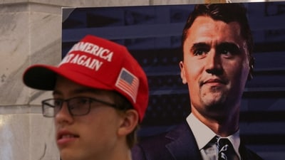 A poster of Charlie Kirk during an event at Utah Valley University, as people attend a vigil for him at the Utah State Capitol, in Salt Lake City, Utah. (Jim Urquhart/Reuters)