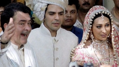Karisma Kapoor and Sunjay Kapur with Randhir Kapoor at their wedding. Karisma Kapoor and Sunjay Kapur with Randhir Kapoor at their wedding.
