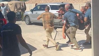 This still image from a video by Jeremy King shows security personnel carrying right-wing activist and influencer Charlie Kirk after he was shot during a public event at Utah Valley University in Orem, Utah. (AFP) This still image from a video by Jeremy King shows security personnel carrying right-wing activist and influencer Charlie Kirk after he was shot during a public event at Utah Valley University in Orem, Utah. (AFP)