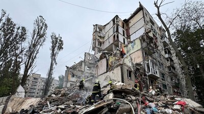 Ukrainian emergency work amid the rubble of a residential building after an air attack in Kyiv. (AFP File) Ukrainian emergency work amid the rubble of a residential building after an air attack in Kyiv. (AFP File)