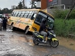 The incident occurred on the infamous Panathur-Balagere road in Bengaluru on Friday morning, a video uploaded on social media showed. The incident occurred on the infamous Panathur-Balagere road in Bengaluru on Friday morning, a video uploaded on social media showed.