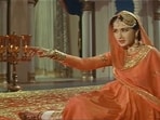 Meena Kumari in Pakeezah. “The music and film actors strewn along the narrative... aren’t throwaway references; they’re lifelines connecting mother and son. Sridevi, Meena Kumari, Sonu Nigam, and Shah Rukh Khan all play their parts; indeed, each animates the duo’s imagination as much as their professional and personal lives.” (Film still)