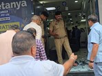 Police inspecting crime spot in Kurukshetra on Friday. (HT Photo) Police inspecting crime spot in Kurukshetra on Friday. (HT Photo)