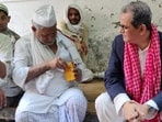 Veteran journalist Late Sankarshan Thakur (right) during the 2024 Lok Sabha election campaign in Varanasi. (Photo from X) Veteran journalist Late Sankarshan Thakur (right) during the 2024 Lok Sabha election campaign in Varanasi. (Photo from X)