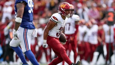 Austin Ekeler #30 of the Washington Commanders in action vs New York Giants (Getty Images via AFP) Austin Ekeler #30 of the Washington Commanders in action vs New York Giants (Getty Images via AFP)