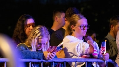 Attendees bow their heads in prayer during a vigil for Charlie Kirk at Rudder Plaza on the Texas A&M Campus in College Station, Texas, Thursday, Sept. 11, 2025. (Meredith Seaver/College Station Eagle via AP) (AP) Attendees bow their heads in prayer during a vigil for Charlie Kirk at Rudder Plaza on the Texas A&M Campus in College Station, Texas, Thursday, Sept. 11, 2025. (Meredith Seaver/College Station Eagle via AP) (AP)