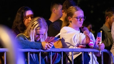 Attendees bow their heads in prayer during a vigil for Charlie Kirk at Rudder Plaza on the Texas A&M Campus in College Station (AP) Attendees bow their heads in prayer during a vigil for Charlie Kirk at Rudder Plaza on the Texas A&M Campus in College Station (AP)