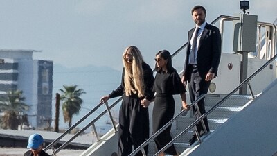 JD Vance, his wife Usha Vance and wife activist Charlie Kirk, Erika Frantzve, exit Air Force Two (REUTERS)