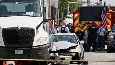 Police officers and first responders work at the scene following reports of a shooting in Franklin Park village (REUTERS)