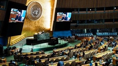 Riyad H. Mansour, Palestinian Permanent Observer to the United Nations, on screens as he addresses delegates after the United Nations General Assembly vote on the Question of Palestine and the Implementation of the Two-State Solution, at UN headquarters in New York City on Sept 12. (REUTERS)
