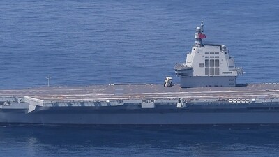 China's third and newest aircraft carrier, the Fujian, sailing in the East China Sea. (AFP) China's third and newest aircraft carrier, the Fujian, sailing in the East China Sea. (AFP)