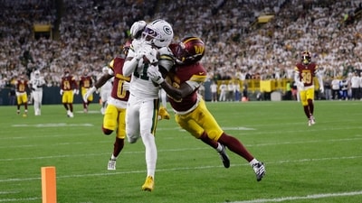 Green Bay Packers wide receiver Jayden Reed (11) makes a catch vs Commanders (AP) Green Bay Packers wide receiver Jayden Reed (11) makes a catch vs Commanders (AP)