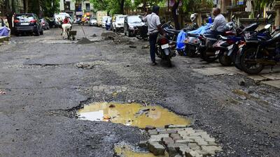 Mumbai, India - July 3, 2019:Pothole Repiring work going on at Pratiksha Nagar sion in Mumbai, India, on Wednesday, July 3, 2019. (Photo by Vijayanand Gupta/Hindustan Times) (Vijayanand Gupta/HT Photo) Mumbai, India - July 3, 2019:Pothole Repiring work going on at Pratiksha Nagar sion in Mumbai, India, on Wednesday, July 3, 2019. (Photo by Vijayanand Gupta/Hindustan Times) (Vijayanand Gupta/HT Photo)