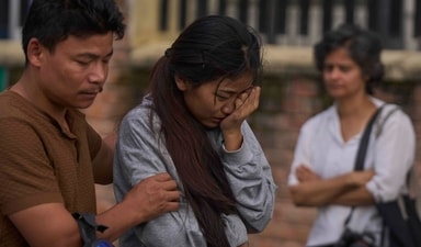Relatives of a person killed during anti-corruption protests that erupted after a social media ban, later revoked, react at the postmortem block of the Teaching Hospital in Kathmandu (AP) Relatives of a person killed during anti-corruption protests that erupted after a social media ban, later revoked, react at the postmortem block of the Teaching Hospital in Kathmandu (AP)