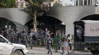 Armed Police Force (APF) personnel outside the Parliament building as security heightens in the wake of the anti-government protests, in Kathmandu, Nepal, Friday. (PTI)