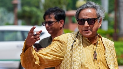 Congress MP Shashi Tharoor arrives to attend the Monsoon session of Parliament, in New Delhi. (PTI) Congress MP Shashi Tharoor arrives to attend the Monsoon session of Parliament, in New Delhi. (PTI)
