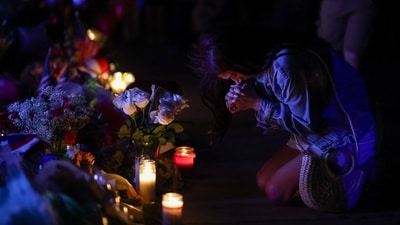 A woman reacts at a memorial for Charlie Kirk at the Turning Point USA headquarters on September 11, 2025 in Phoenix, Arizona. Kirk the CEO and co-founder of Turning Point USA was shot and killed on Wednesday in Utah. on September 11, 2025 in Phoenix, Arizona. (Getty Images via AFP) A woman reacts at a memorial for Charlie Kirk at the Turning Point USA headquarters on September 11, 2025 in Phoenix, Arizona. Kirk the CEO and co-founder of Turning Point USA was shot and killed on Wednesday in Utah. on September 11, 2025 in Phoenix, Arizona. (Getty Images via AFP)