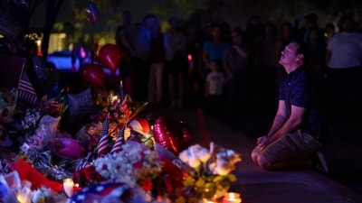 A man prays at a memorial for Charlie Kirk at the Turning Point USA headquarters on September 11, 2025 in Phoenix, Arizona. (Getty Images via AFP) A man prays at a memorial for Charlie Kirk at the Turning Point USA headquarters on September 11, 2025 in Phoenix, Arizona. (Getty Images via AFP)