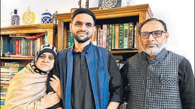 Umar Khalid with his parents in December 2024, when he was last released on interim bail. (HT PHOTO)