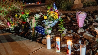 A makeshift memorial was made outside the mortuary where the body of slain conservative activist Charlie Kirk was delivered, in Phoenix, Arizona. (Reuters)
