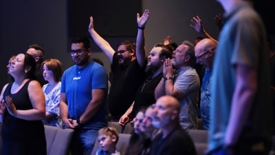 People raise and clasp their hands during a prayer event at CenterPoint Church, the day after Charlie Kirk, the CEO and co-founder of Turning Point USA was shot and killed (AP) People raise and clasp their hands during a prayer event at CenterPoint Church, the day after Charlie Kirk, the CEO and co-founder of Turning Point USA was shot and killed (AP)
