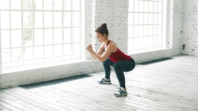 Squat is one of the forms of strength training that helps to tone your thighs. (PC: Freepik) Squat is one of the forms of strength training that helps to tone your thighs. (PC: Freepik)