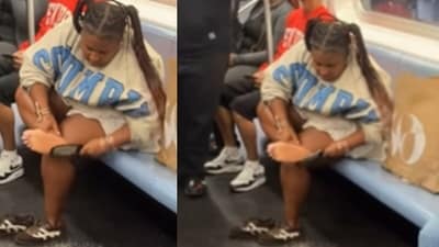A woman exfoliated her bare feet on a New York subway, sparking outrage online. (Instagram/1776qqqqq) A woman exfoliated her bare feet on a New York subway, sparking outrage online. (Instagram/1776qqqqq)