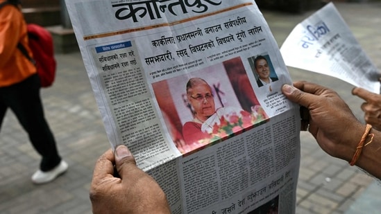 A Nepali-language newspaper featuring the country's former chief justice Sushila Karki on September 12. (AFP)