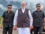 Prime Minister Narendra Modi arrives at Aizawl for the inauguration of the Bairabi-Sairang New Rail line, in Aizawl on Saturday. Modi later arrived in Manipur to interact with displaced people and lay the foundation stones of several projects. (ANI Photo)