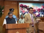 Punjab governor Gulab Chand Kataria administering the oath of office to a member at the Punjab Raj Bhawan in Chandigarh on Friday.