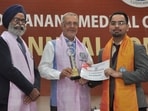 Punjab health minister Dr Balbir Singh (centre) confer a degree upon a graduate at Dayanand Medical College and Hospital on Saturday. (HT Photo for representation) Punjab health minister Dr Balbir Singh (centre) confer a degree upon a graduate at Dayanand Medical College and Hospital on Saturday. (HT Photo for representation)