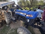 The mangled remains of the tractor-trolley which overturned after a Haryana Roadways bus hit into it in Sirsa on Saturday. (HT Photo)