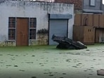 The streets of Sangwan village inundated due to waterlogging on Saturday in spite of not having rain for the past one week. (HT Photo)