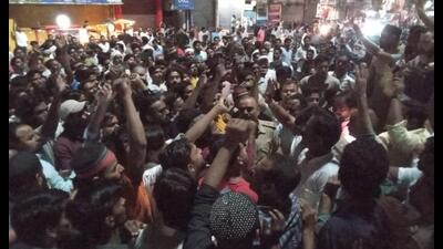 A group of people staging protest over a controversial Facebook post in Shahjahanpur on Friday night. (HT) A group of people staging protest over a controversial Facebook post in Shahjahanpur on Friday night. (HT)