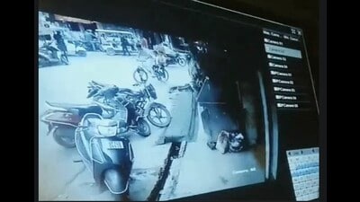 CCTV footage of the man taking the children on a bicycle (Sourced) CCTV footage of the man taking the children on a bicycle (Sourced)