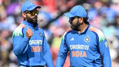 India's Virat Kohli (L) speaks with Rohit Sharma. (AFP) India's Virat Kohli (L) speaks with Rohit Sharma. (AFP)