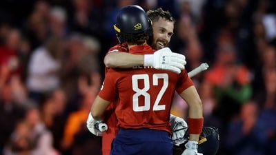 England's Phil Salt celebrates (R) his century during the second T20I against South Africa. (AFP) England's Phil Salt celebrates (R) his century during the second T20I against South Africa. (AFP)