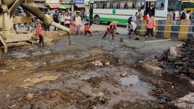 GMDA repairing the bus stand road near the Government Senior Secondary School on Saturday. (HT Photo) GMDA repairing the bus stand road near the Government Senior Secondary School on Saturday. (HT Photo)