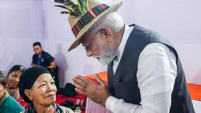 Prime Minister Narendra Modi interacts with violence-hit displaced people, in Manipur’s Churachandpur on Saturday. (DPR PMO) Prime Minister Narendra Modi interacts with violence-hit displaced people, in Manipur’s Churachandpur on Saturday. (DPR PMO)