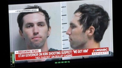 A TV monitor displays a picture of Tyler Robinson, the suspected of killing Charlie Kirk on September 10 (AFP) A TV monitor displays a picture of Tyler Robinson, the suspected of killing Charlie Kirk on September 10 (AFP)